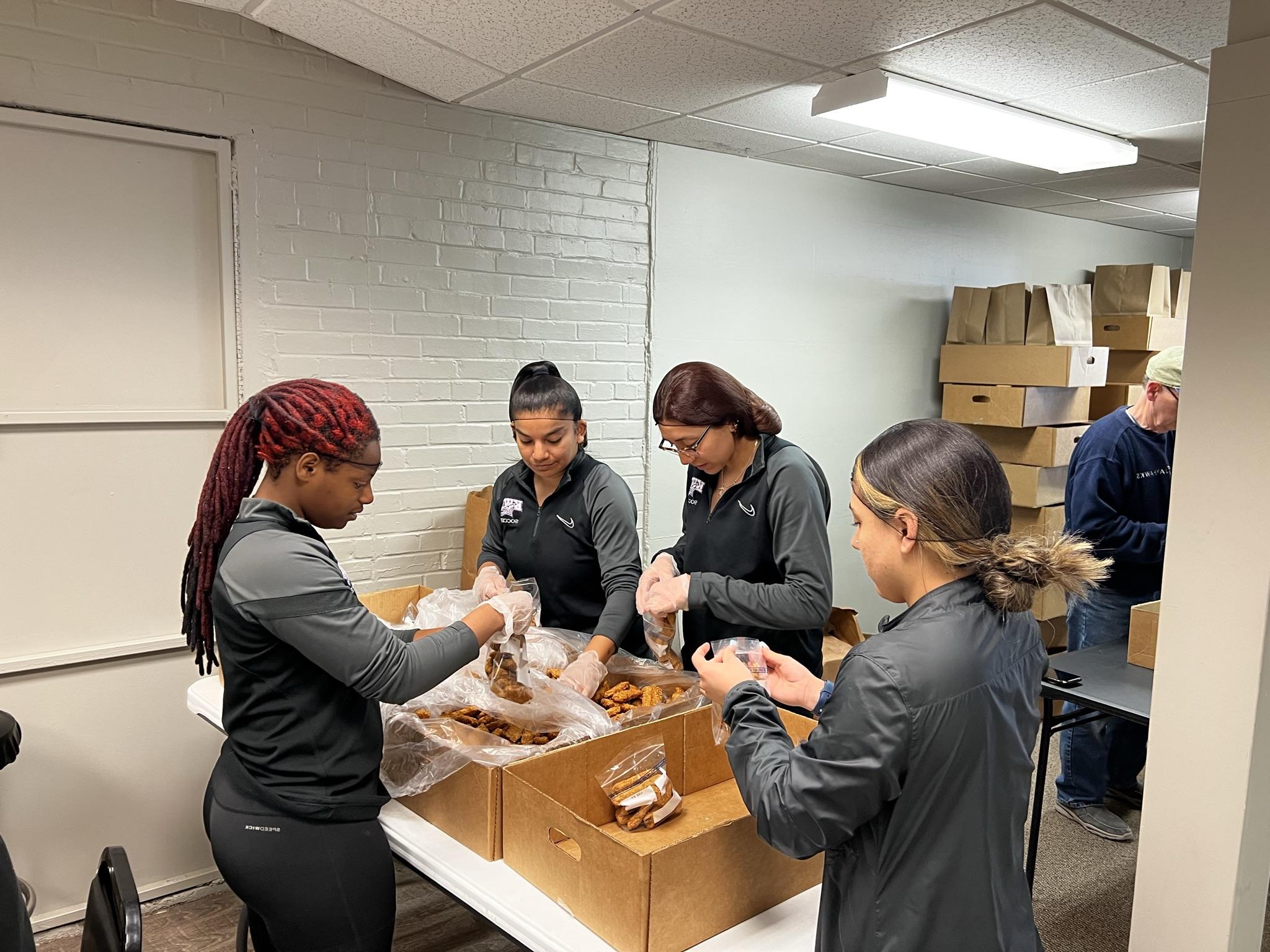 People at food bank-type of event serving